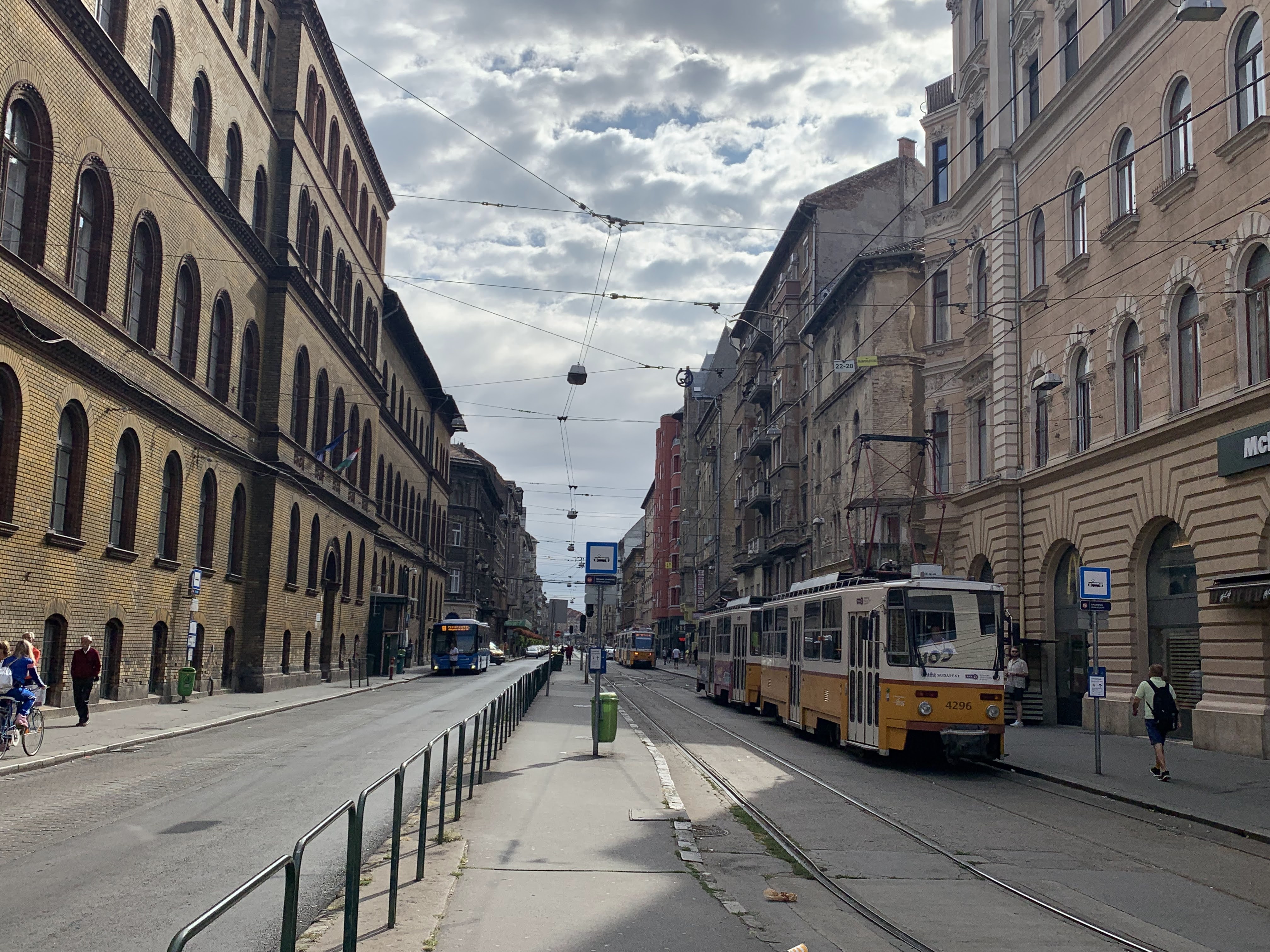 A tram-lined Budapest street on the Pest side, where the pavements and central streets made stroller walking straightforward for our family.