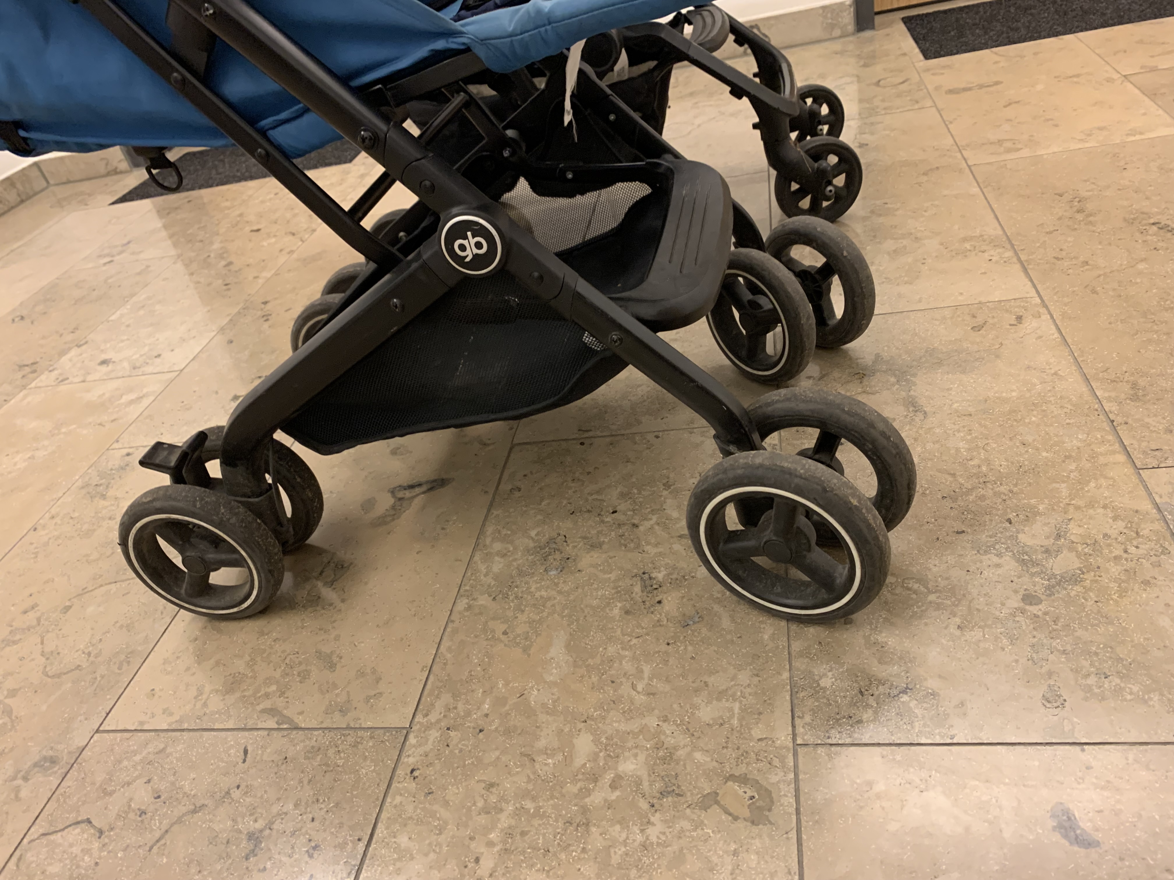 The GB Qbit+ wheel base in close-up, one reason it felt steadier to us than the lighter Easywalker.