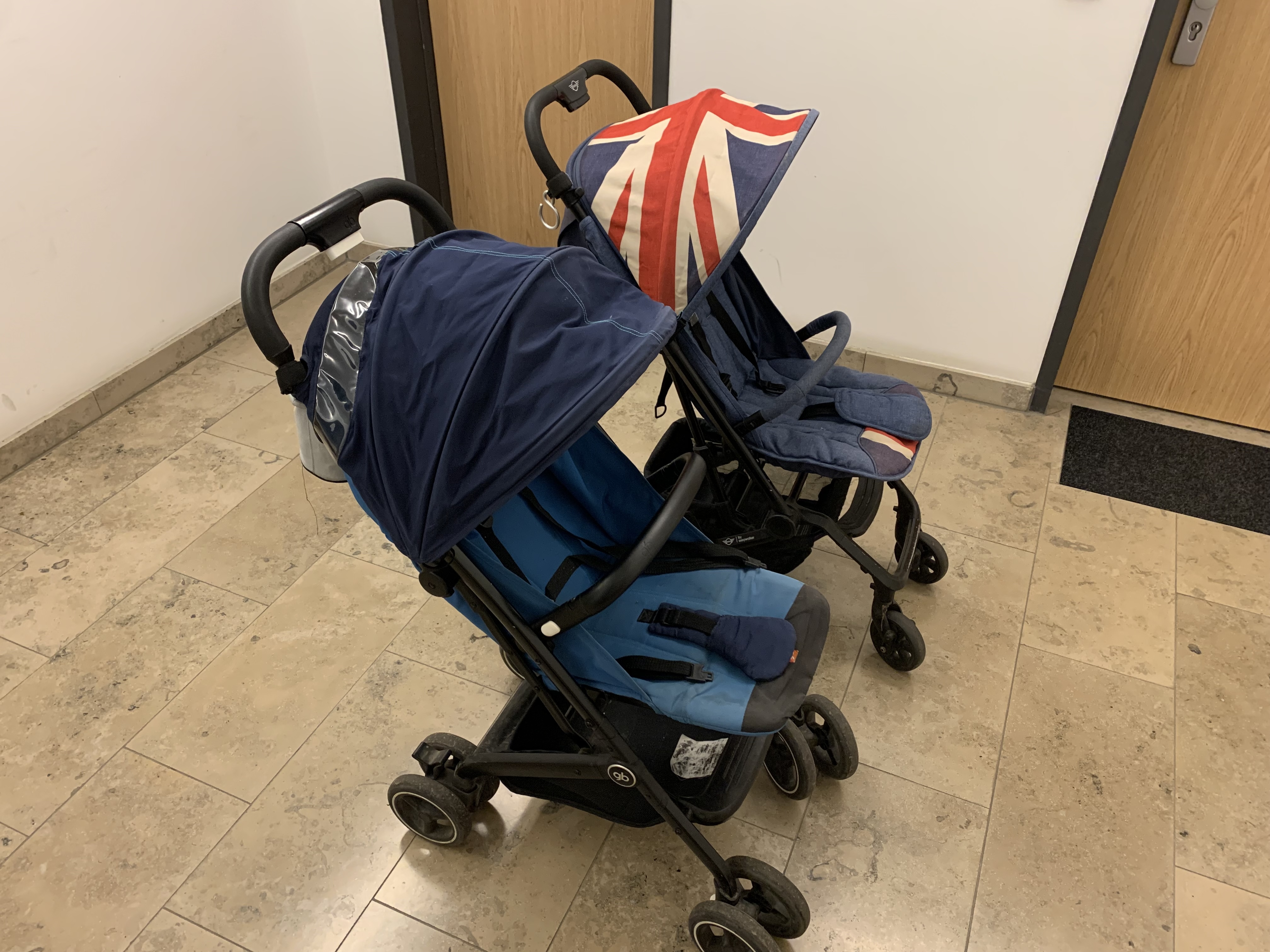 The GB Qbit+ and Easywalker Buggy XS from the side, where the canopy shape and overall profile are easier to compare.