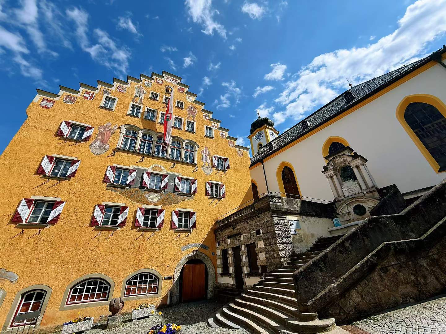 A colorful building view in Kufstein, where the old-town details were pleasant without making the day feel crowded.