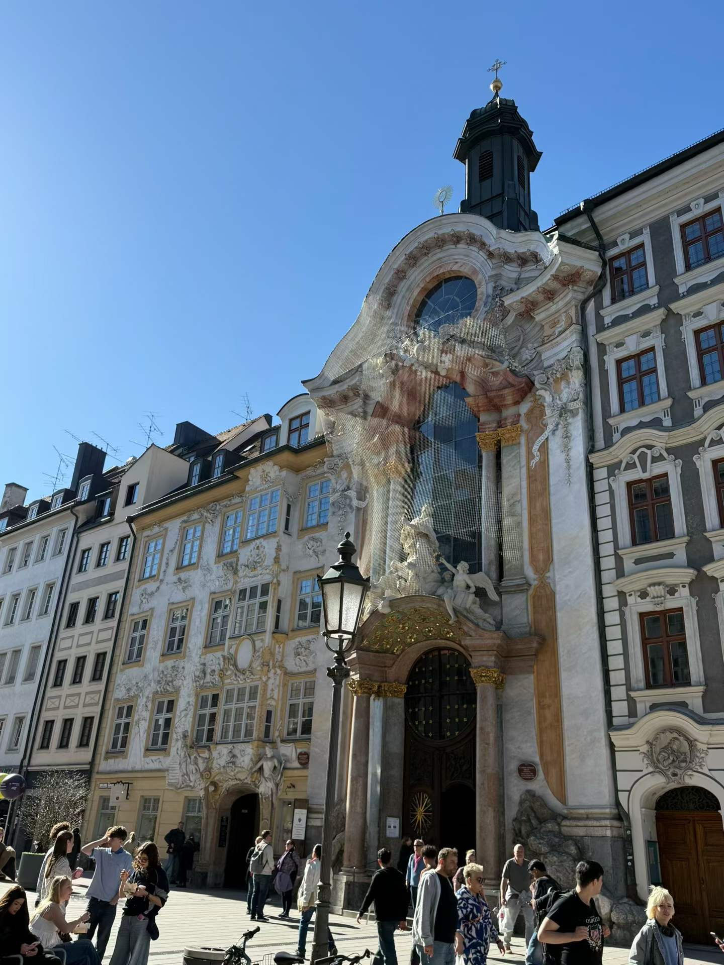 Asamkirche from the street, one of the most visually surprising stops on the later church walk.