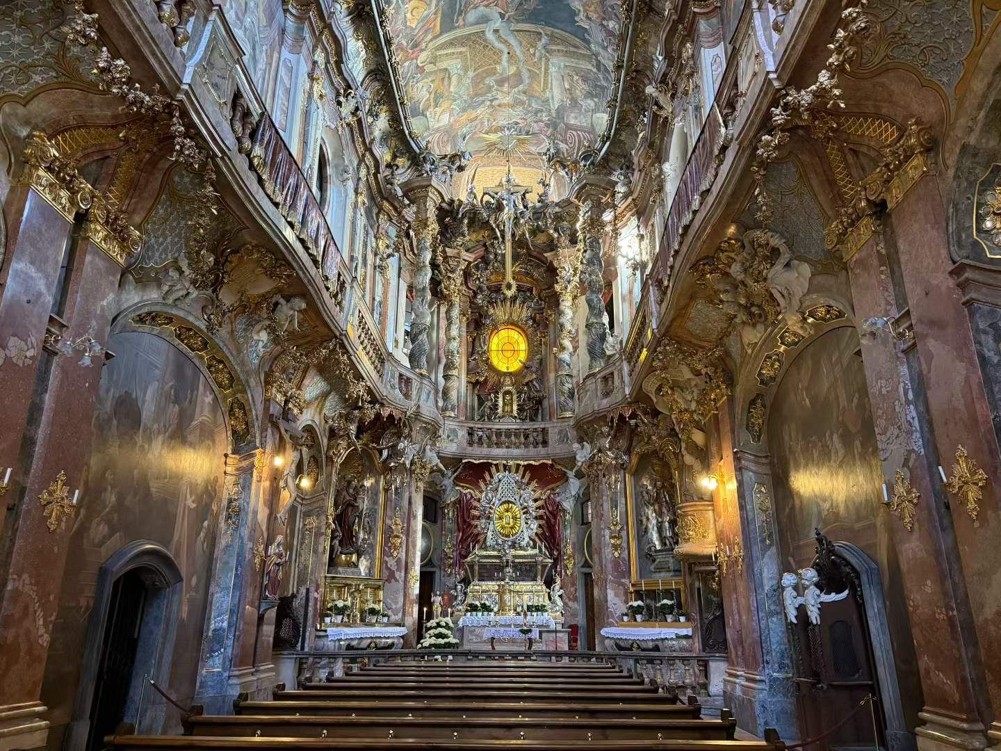 Inside Asamkirche, where the interior was dramatic enough that even a quick visit felt worthwhile.