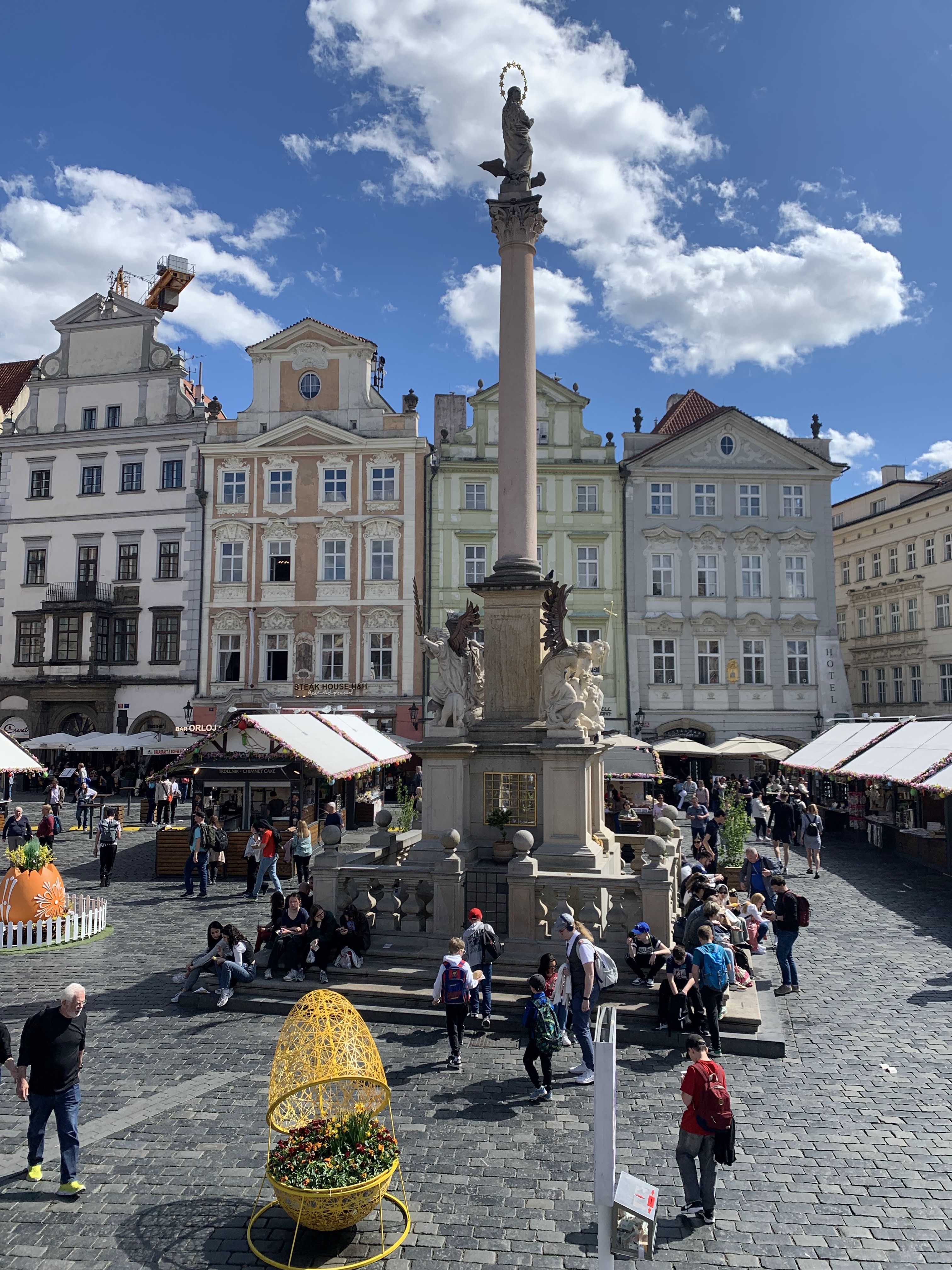 Old Town Square during the Easter market, with spring stalls and Prague’s historic facades around the square.